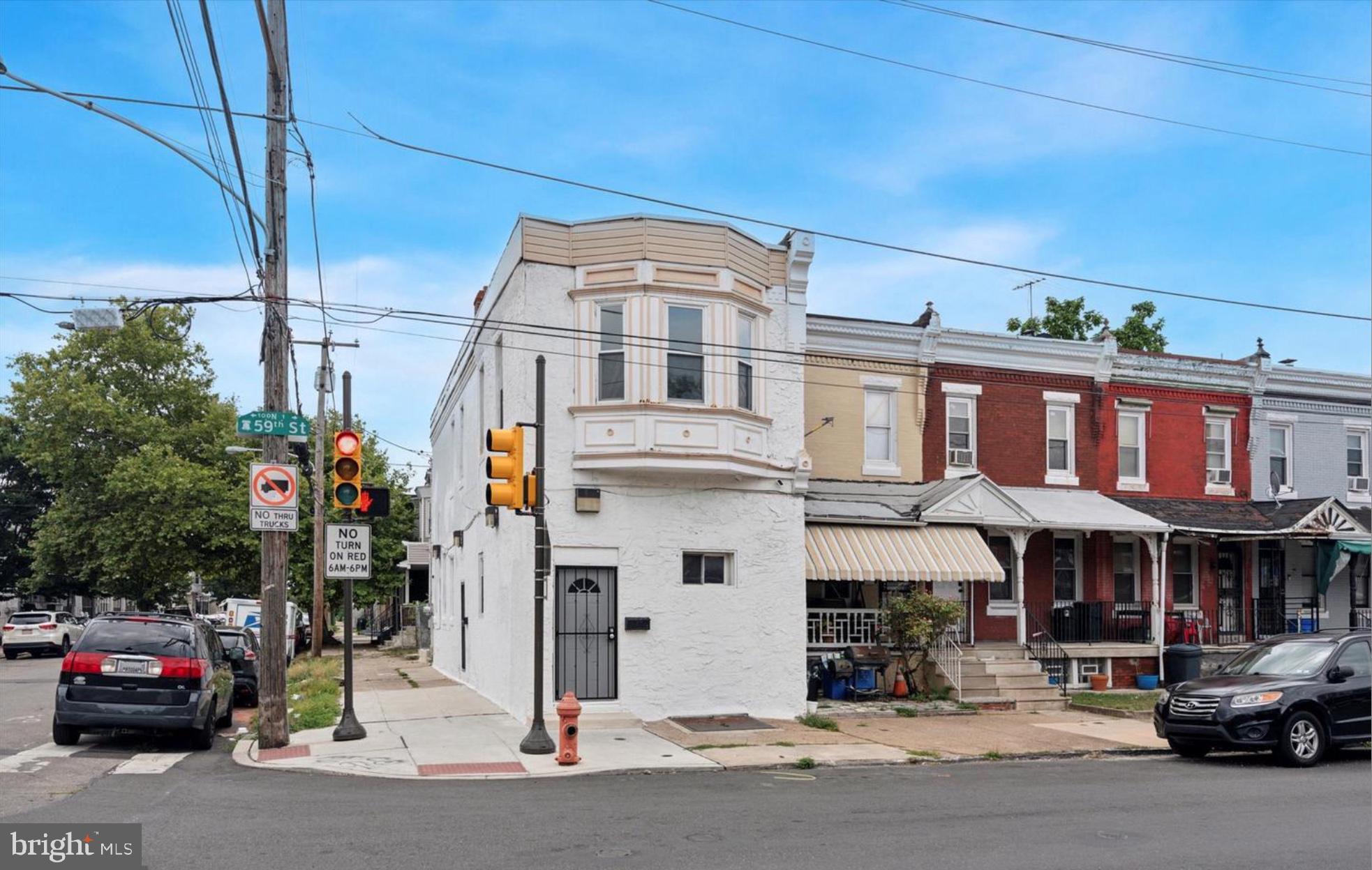59 North 59th Street Philadelphia, PA 19139 - Photo 1 of 15 a front view of a building with street