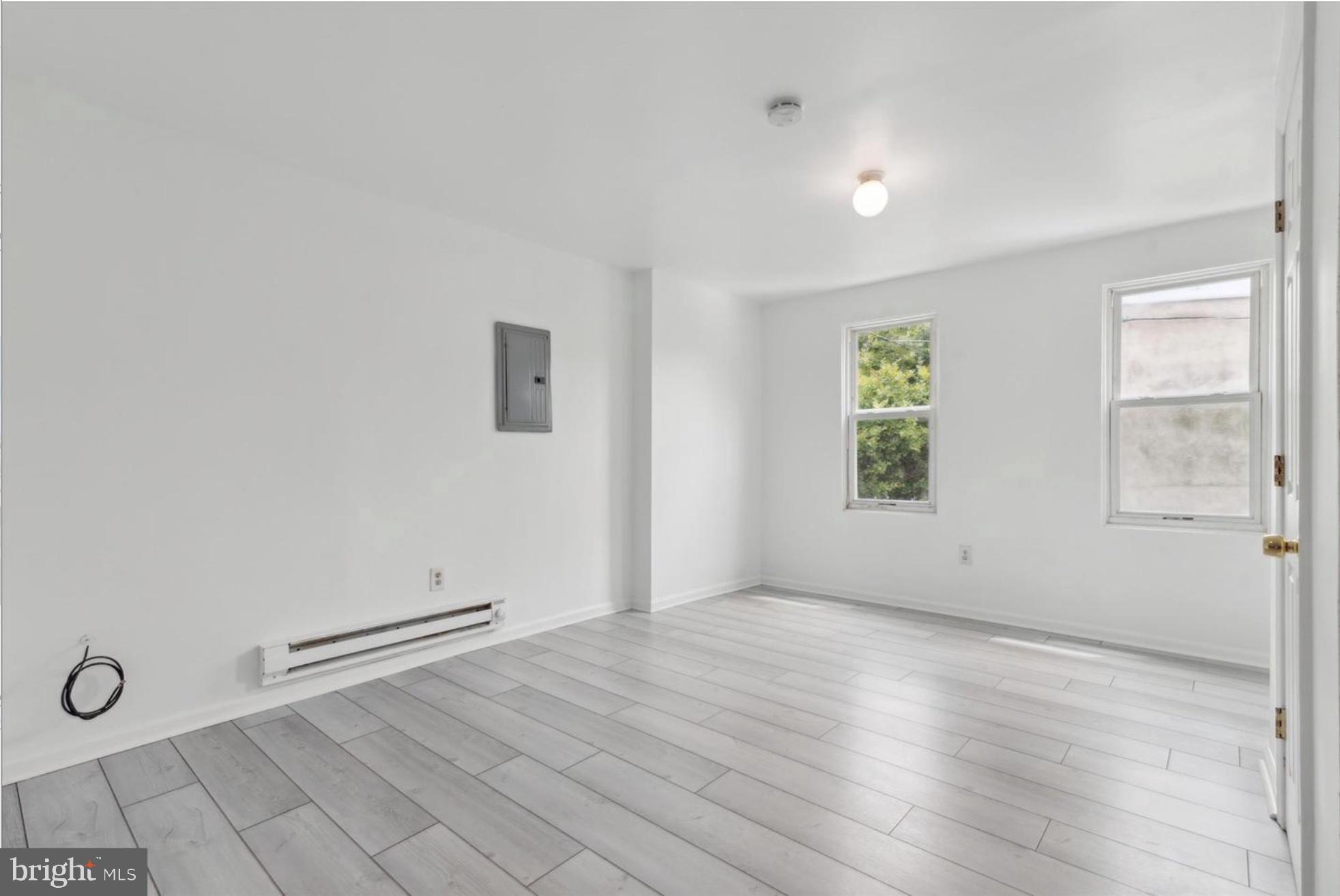 59 North 59th Street Philadelphia, PA 19139 - Photo 11 of 15 an empty room with windows