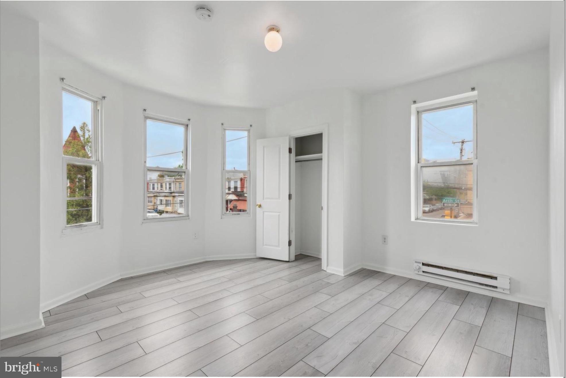 59 North 59th Street Philadelphia, PA 19139 - Photo 9 of 15 an empty room with windows