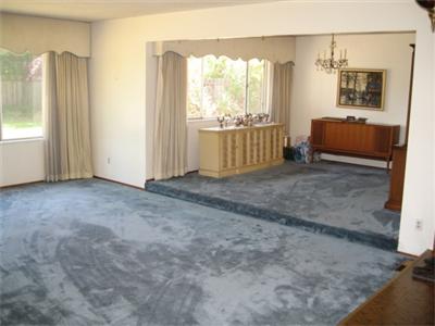9 Creekside Court Santa Rosa, CA 95405 - Photo 7 of 11 Formal dining room and living room look out onto back yard.