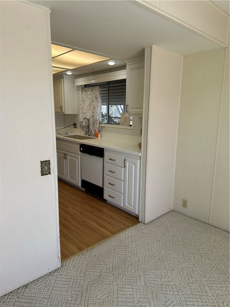 33853 Plowshare Road Wildomar, CA 92595 - Photo 11 of 25 a bathroom with a sink and a mirror