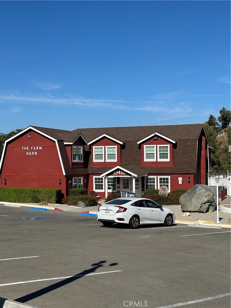 33853 Plowshare Road Wildomar, CA 92595 - Photo 19 of 25 a front view of a building with parking