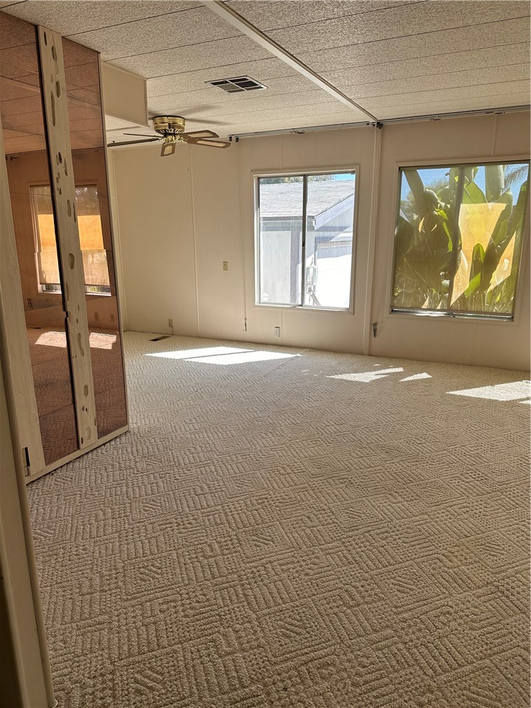 33853 Plowshare Road Wildomar, CA 92595 - Photo 7 of 25 a view of an empty room with a window
