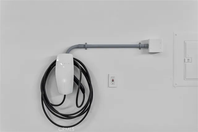 a view of a dining room with furniture and window