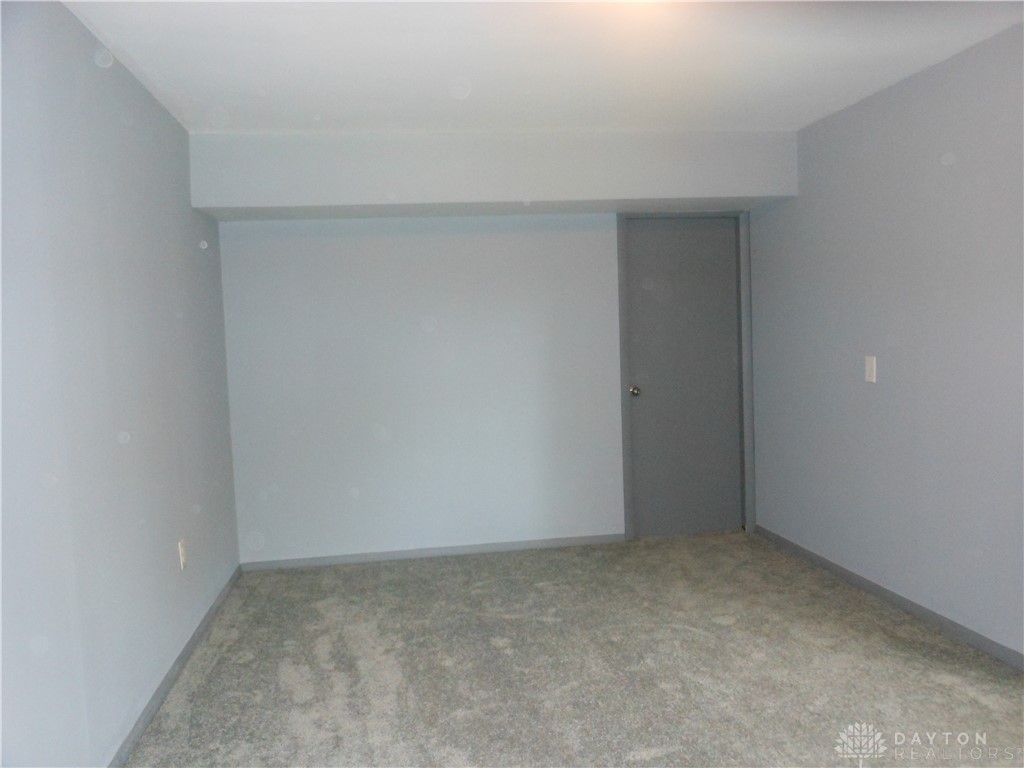 143 West Emerick Road West Milton, OH 45383 - Photo 15 of 37 This versatile room offers a comfortable and neutral space, ready for your personal touch.