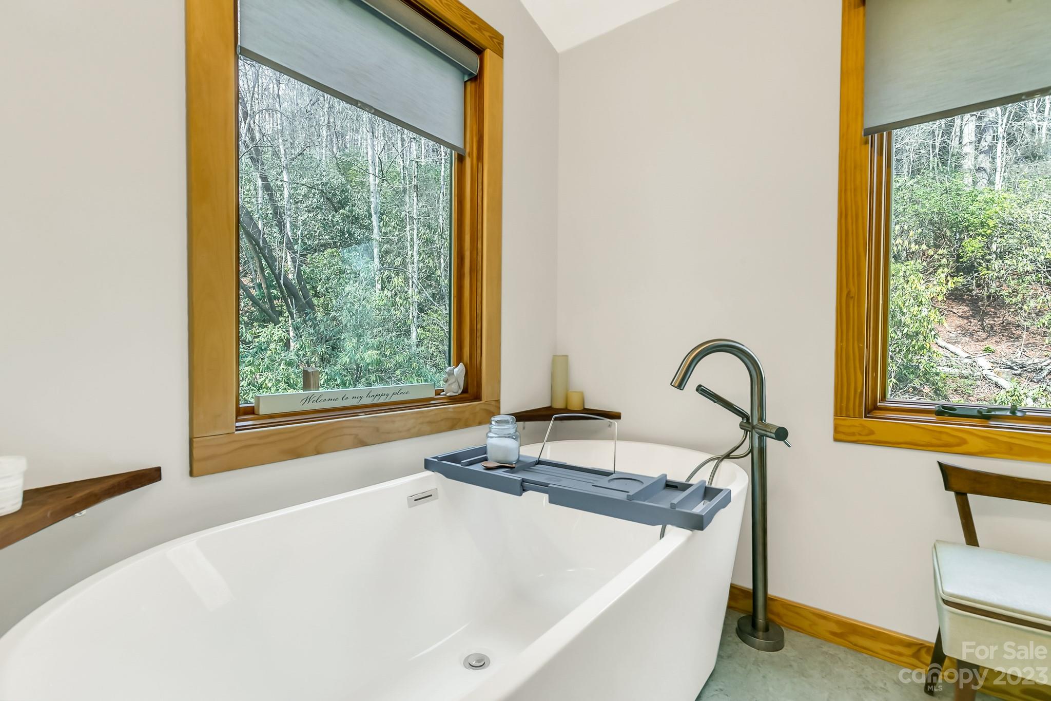 449 Old Powell Road Brevard, NC 28712 - Photo 17 of 48 a white bath tub sitting next to a window