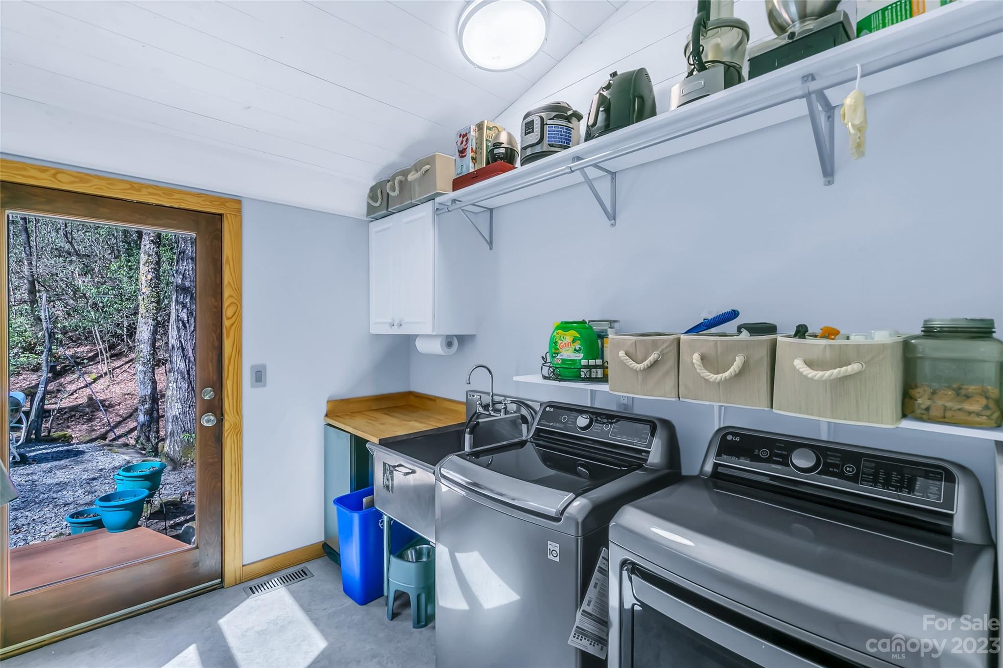 449 Old Powell Road Brevard, NC 28712 - Photo 18 of 48 a utility room with dryer and washer