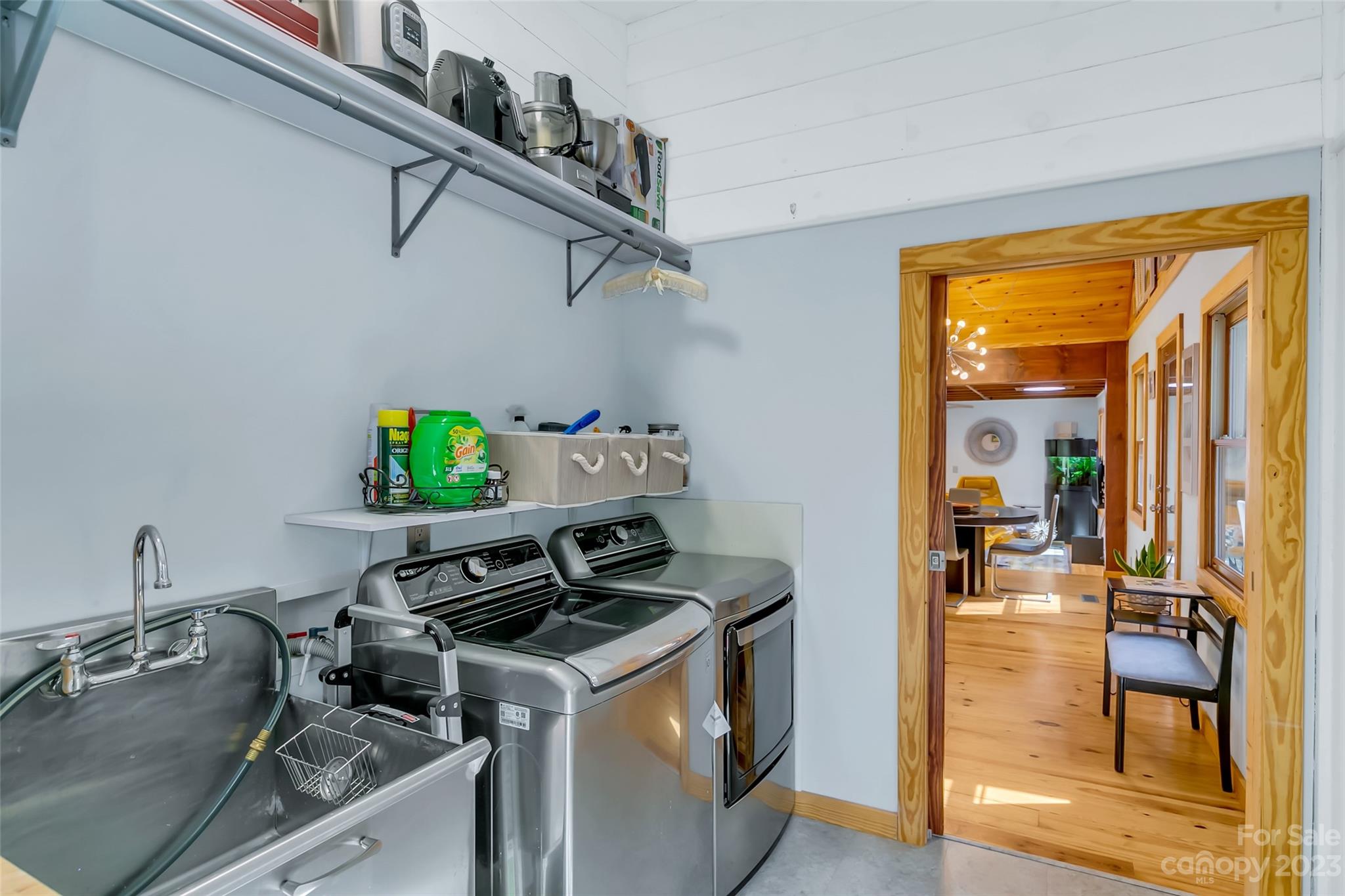 449 Old Powell Road Brevard, NC 28712 - Photo 19 of 48 a kitchen with a stove and a sink