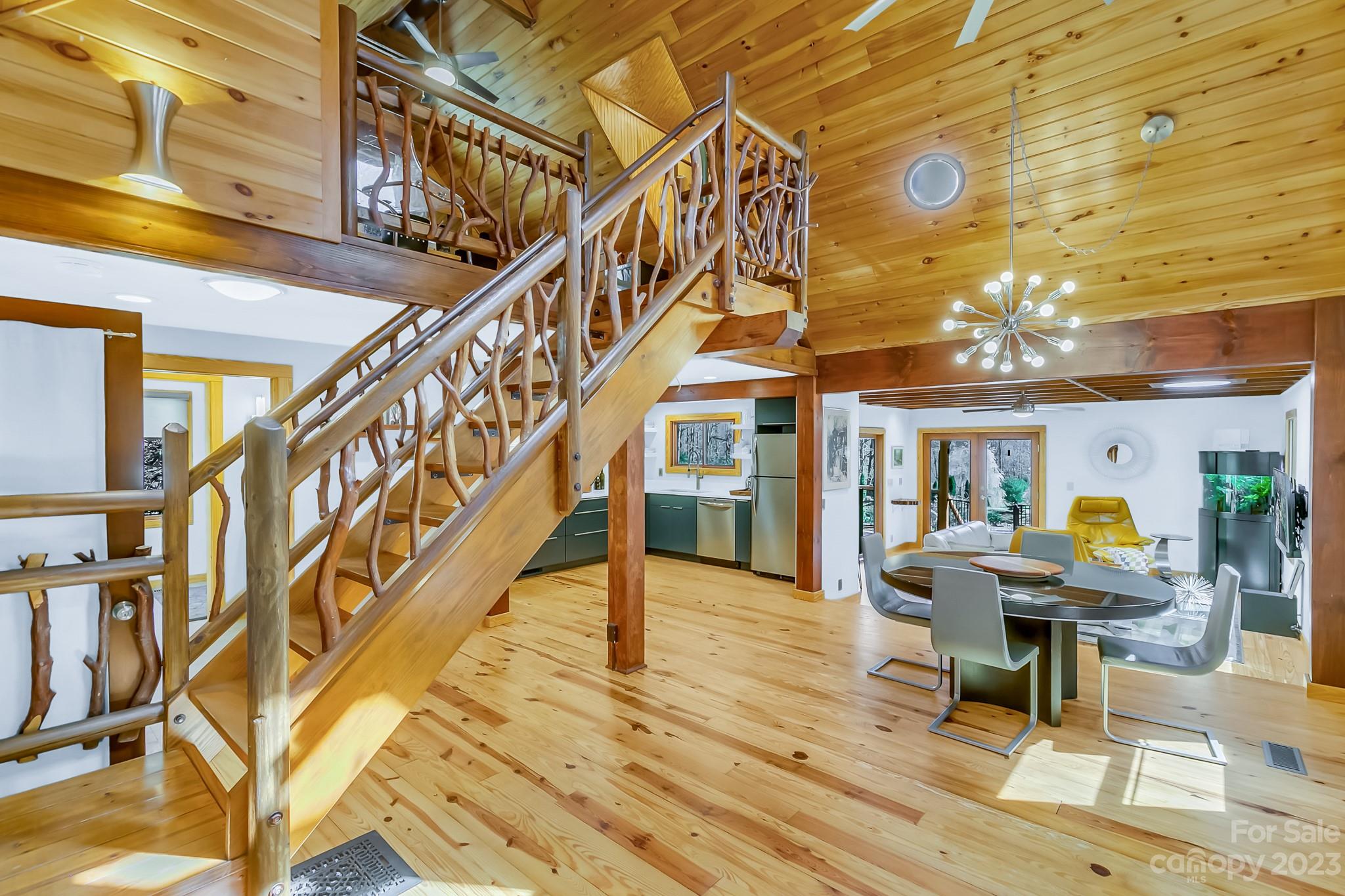 449 Old Powell Road Brevard, NC 28712 - Photo 20 of 48 a view of entryway livingroom and hall with wooden floor