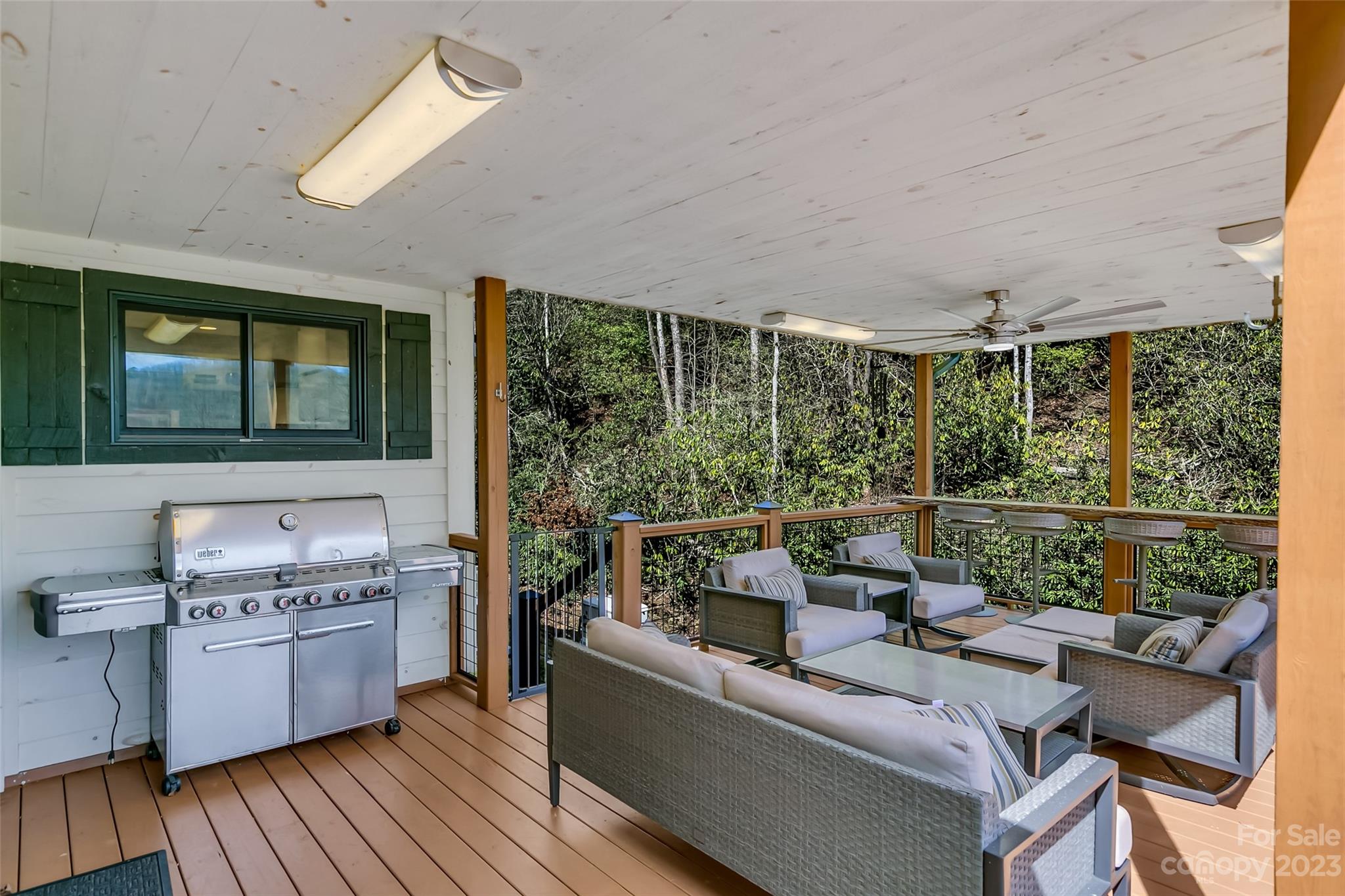 449 Old Powell Road Brevard, NC 28712 - Photo 28 of 48 a living room with furniture and a large window