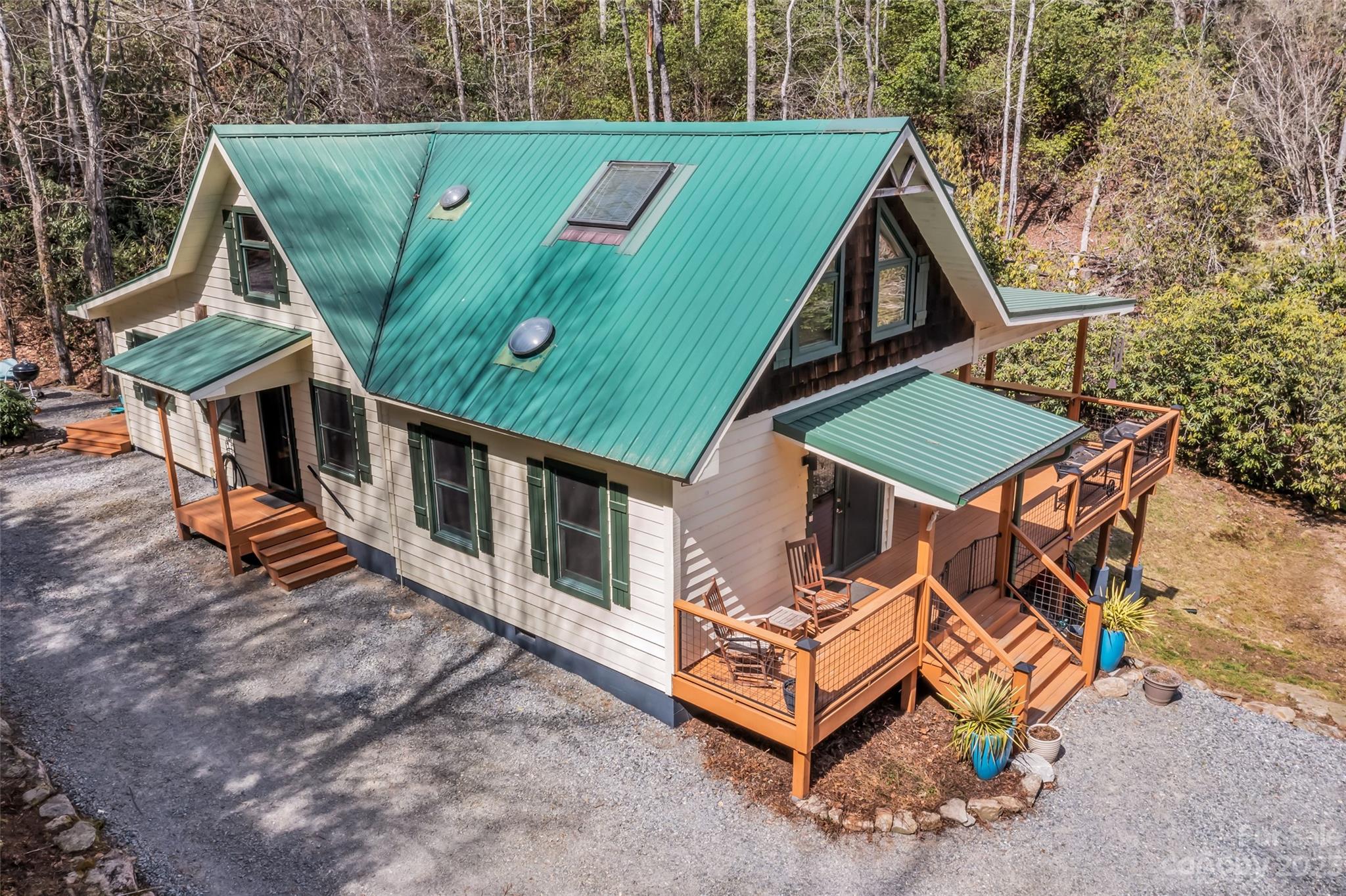449 Old Powell Road Brevard, NC 28712 - Photo 39 of 48 an aerial view of a house with balcony and trees