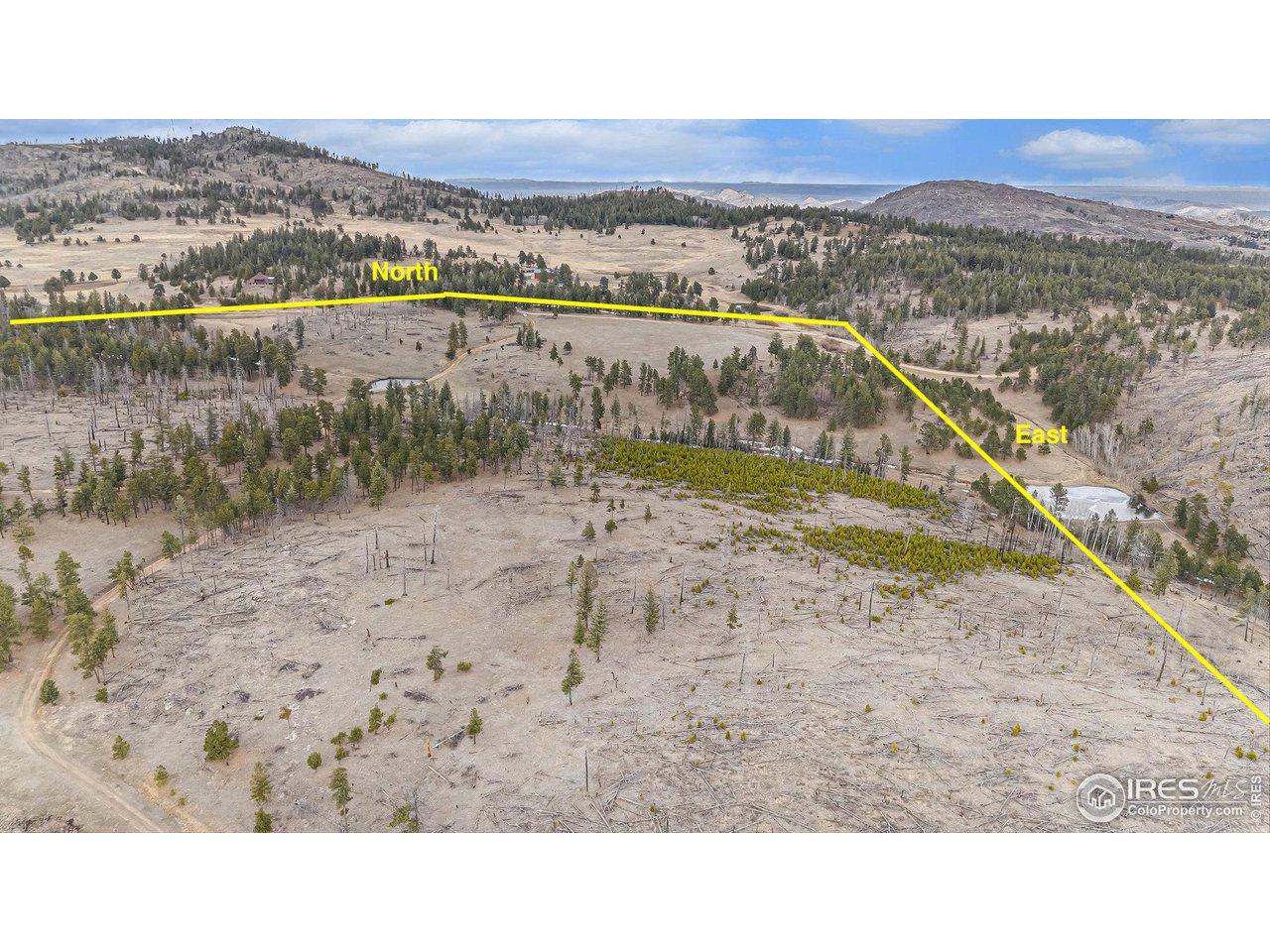 0 Tip Top Road Bellvue, CO 80512 - Photo 14 of 18 a view of a lake with a mountain