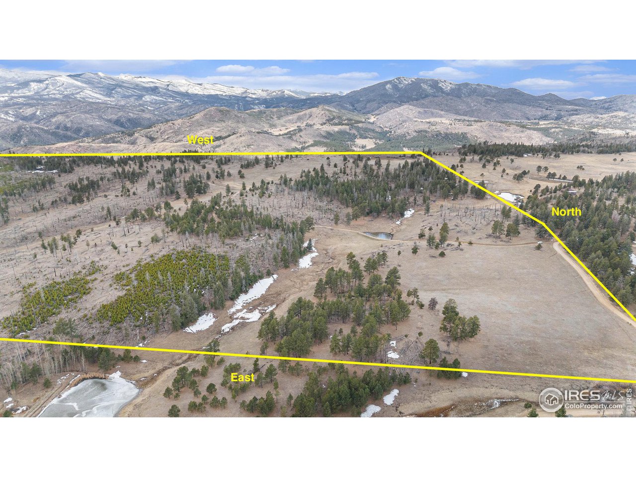 0 Tip Top Road Bellvue, CO 80512 - Photo 16 of 18 a view of a lake from a balcony