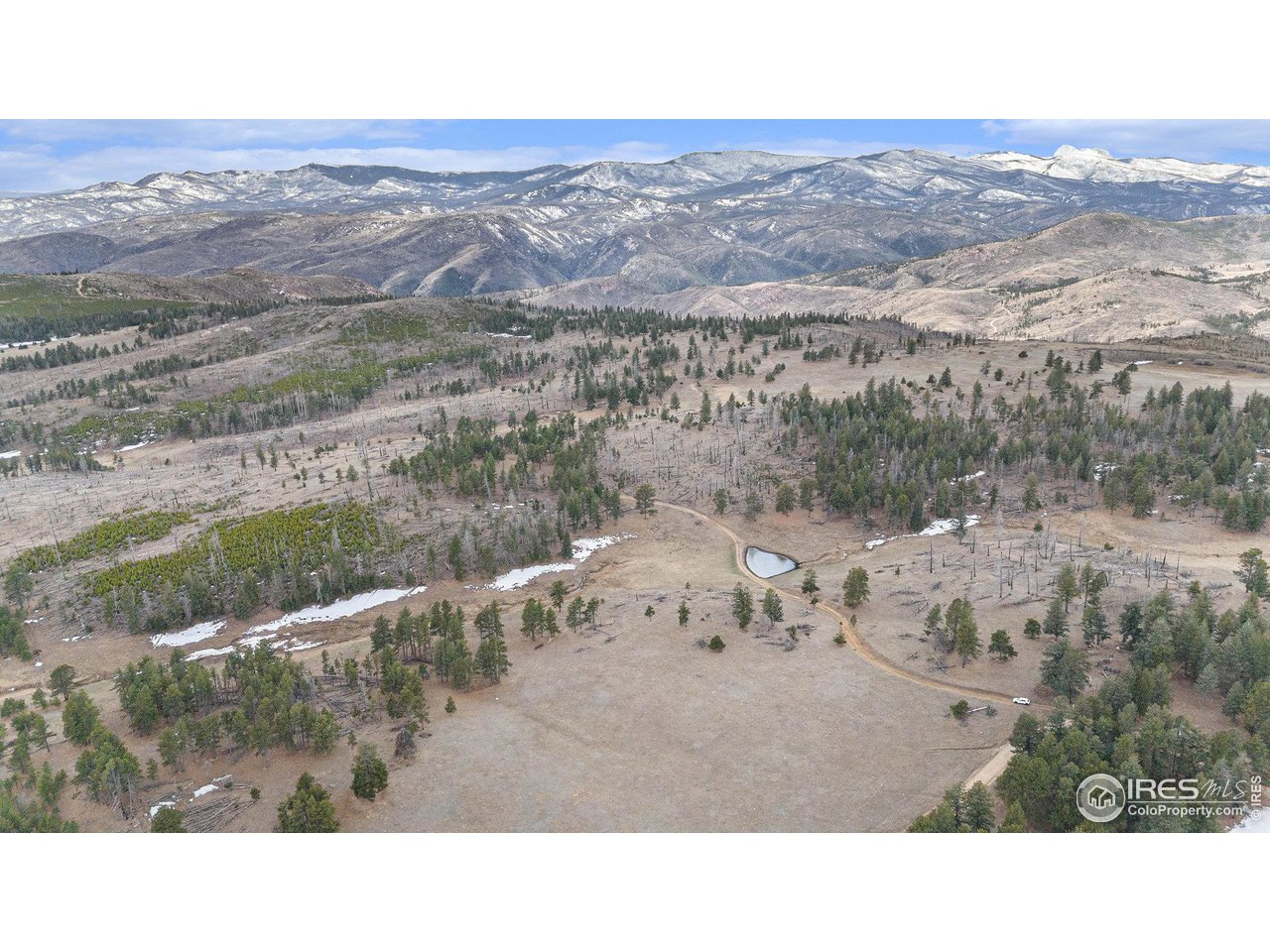 0 Tip Top Road Bellvue, CO 80512 - Photo 6 of 18 a black and white photo of a lake