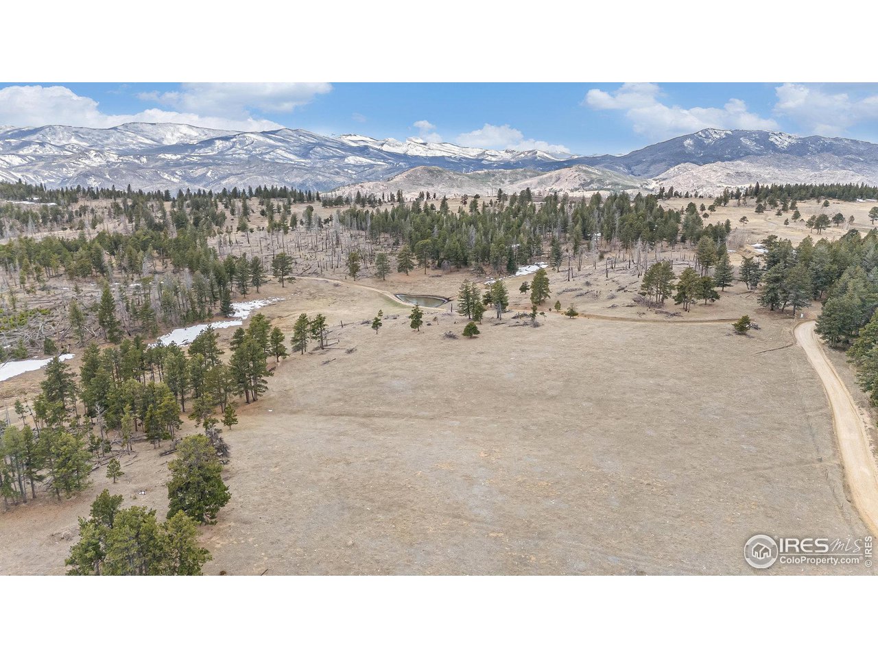 0 Tip Top Road Bellvue, CO 80512 - Photo 9 of 18 a view of a lake with a mountain