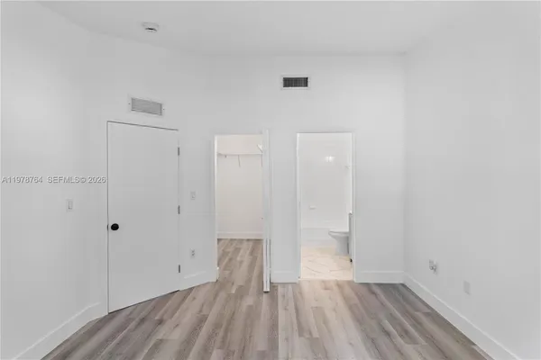 a view of small space with wooden floor