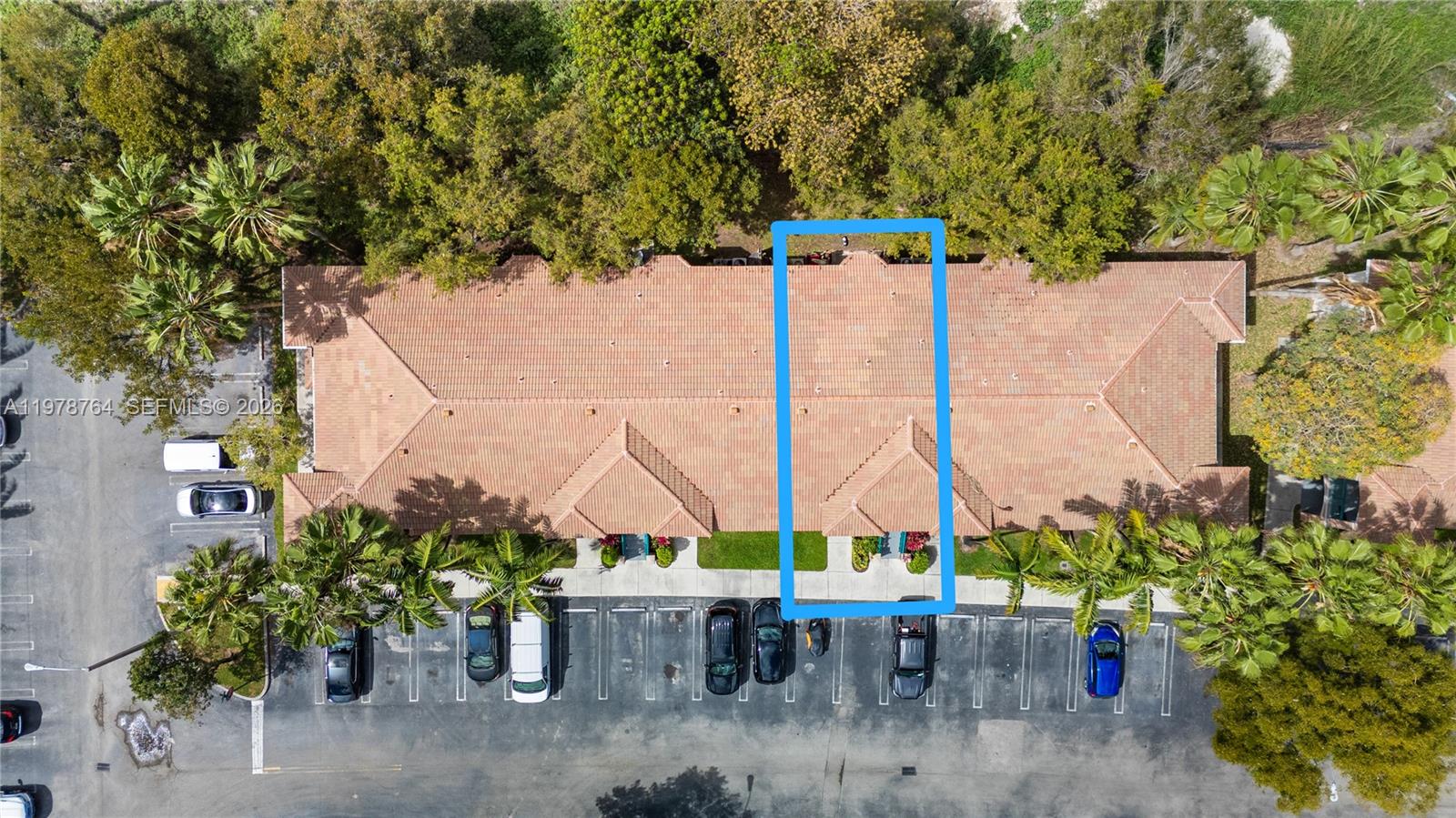 2930 Southeast 12th Road, Unit 20431 Homestead, FL 33035 - Photo 32 of 33 an outdoor sitting area with furniture and garden view