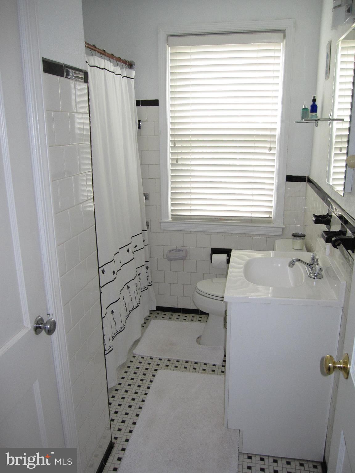 164 Stanmore Road Baltimore, MD 21212 - Photo 14 of 25 There is also a clean bathroom in the lower level.