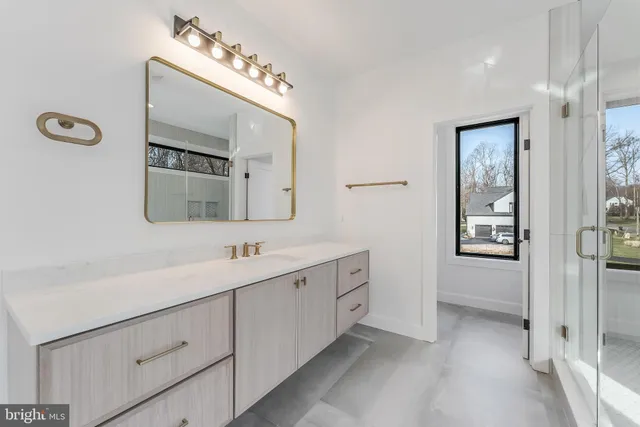 a bathroom with a toilet sink a shower and