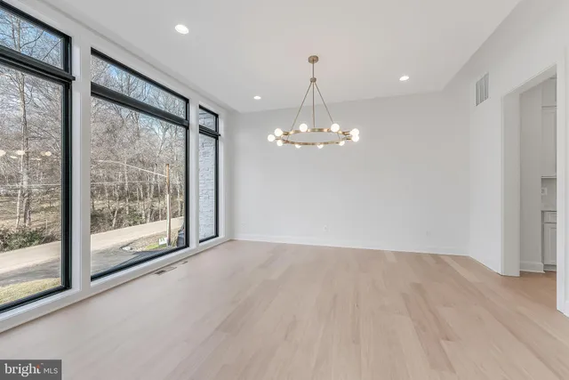 a view of a chandelier in a room and a chandelier