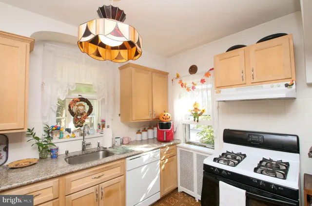 a bathroom with a sink a bathtub and a shower