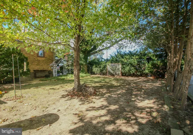 a living room with furniture fireplace and a flat screen tv