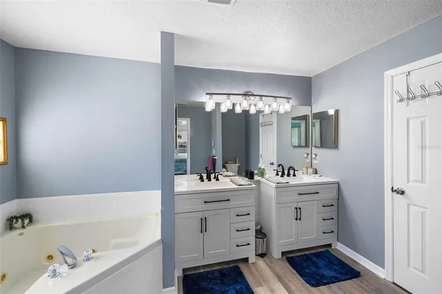 a picture of a bathroom with a shower