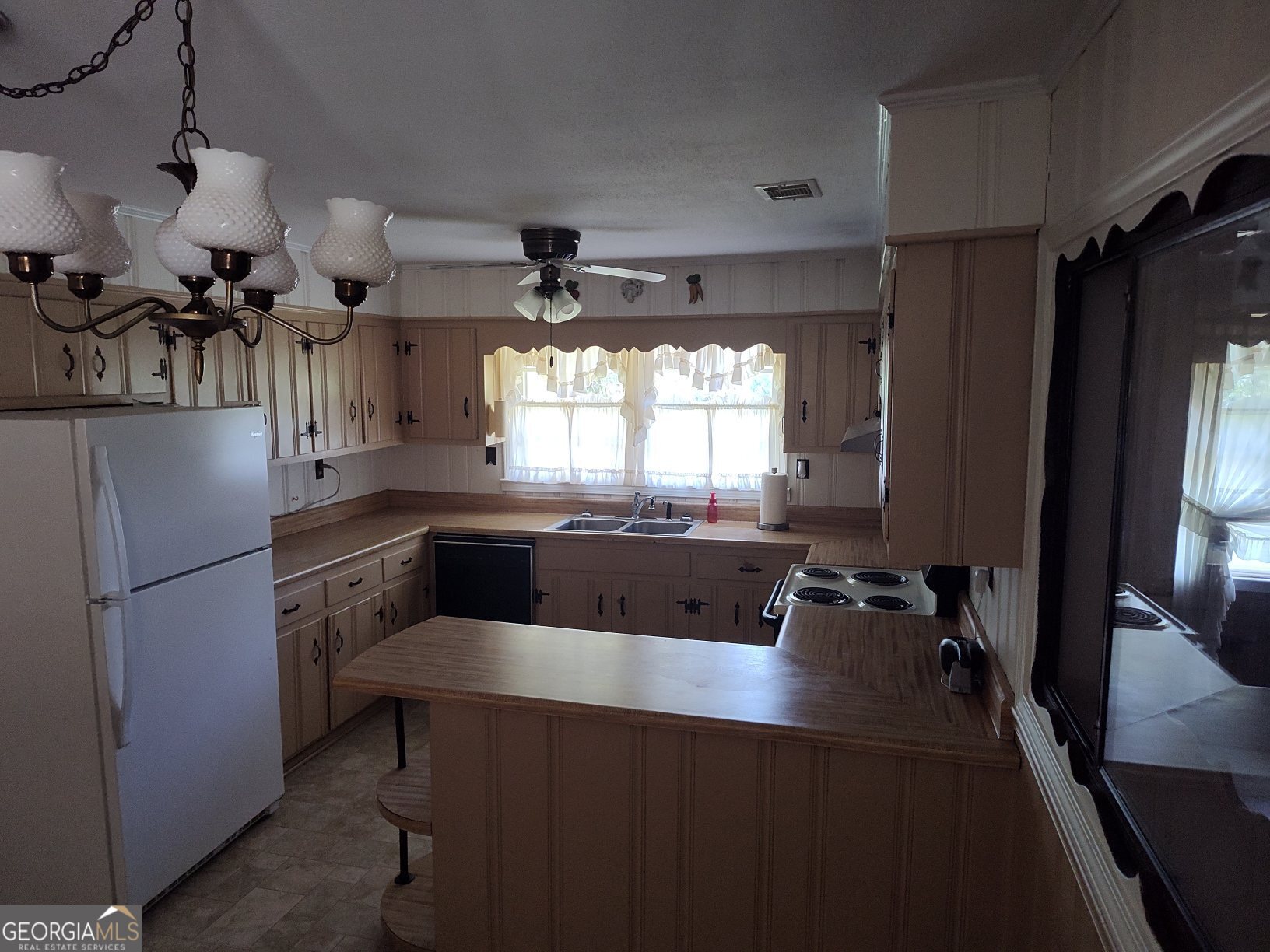 2289 Dr George Ward Road Elberton, GA 30635 - Photo 2 of 13 a kitchen with a sink appliances and a counter top