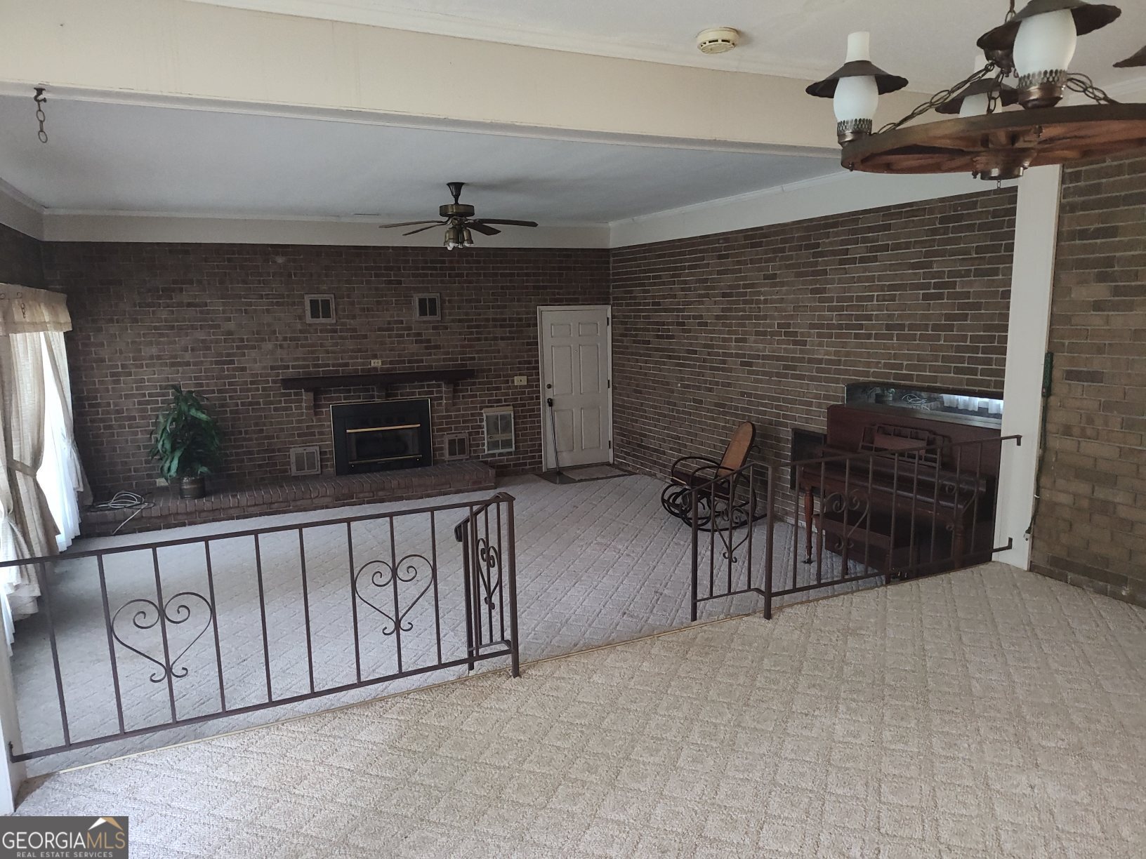 2289 Dr George Ward Road Elberton, GA 30635 - Photo 5 of 13 a view of a livingroom with furniture and a fireplace