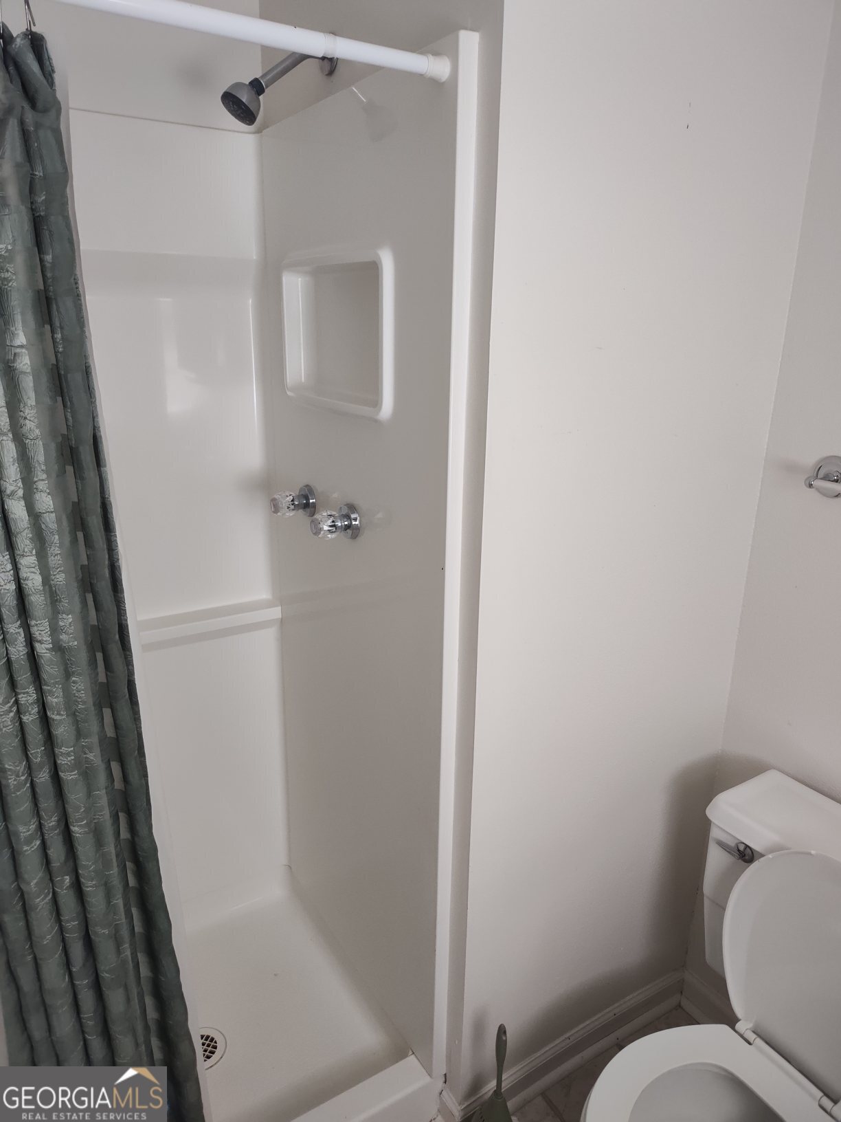 2289 Dr George Ward Road Elberton, GA 30635 - Photo 10 of 13 a bathroom with a toilet and a shower