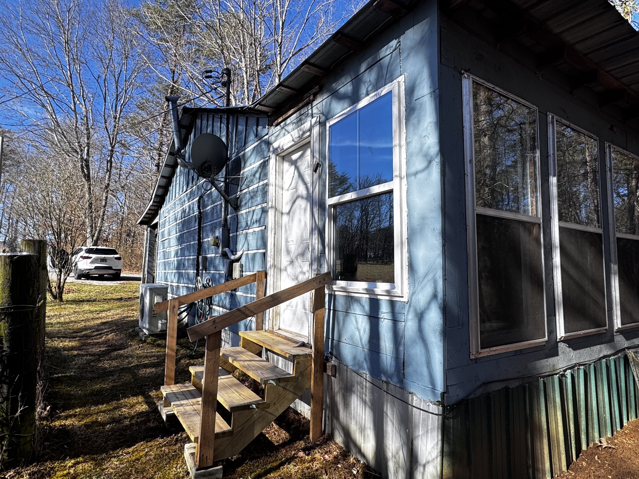 829 Highway 399 Palmer, TN 37365 - Photo 6 of 18 a view of a house with a door
