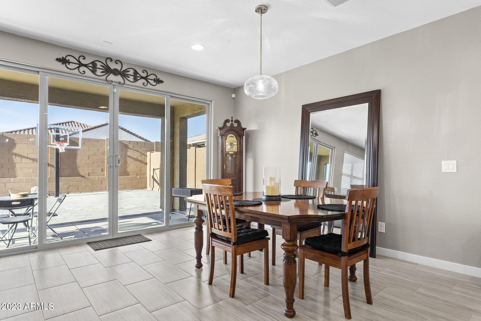 12356 East Soloman Road Gold Canyon, AZ 85118 - Photo 14 of 53 a view of a dining room with furniture and a chandelier