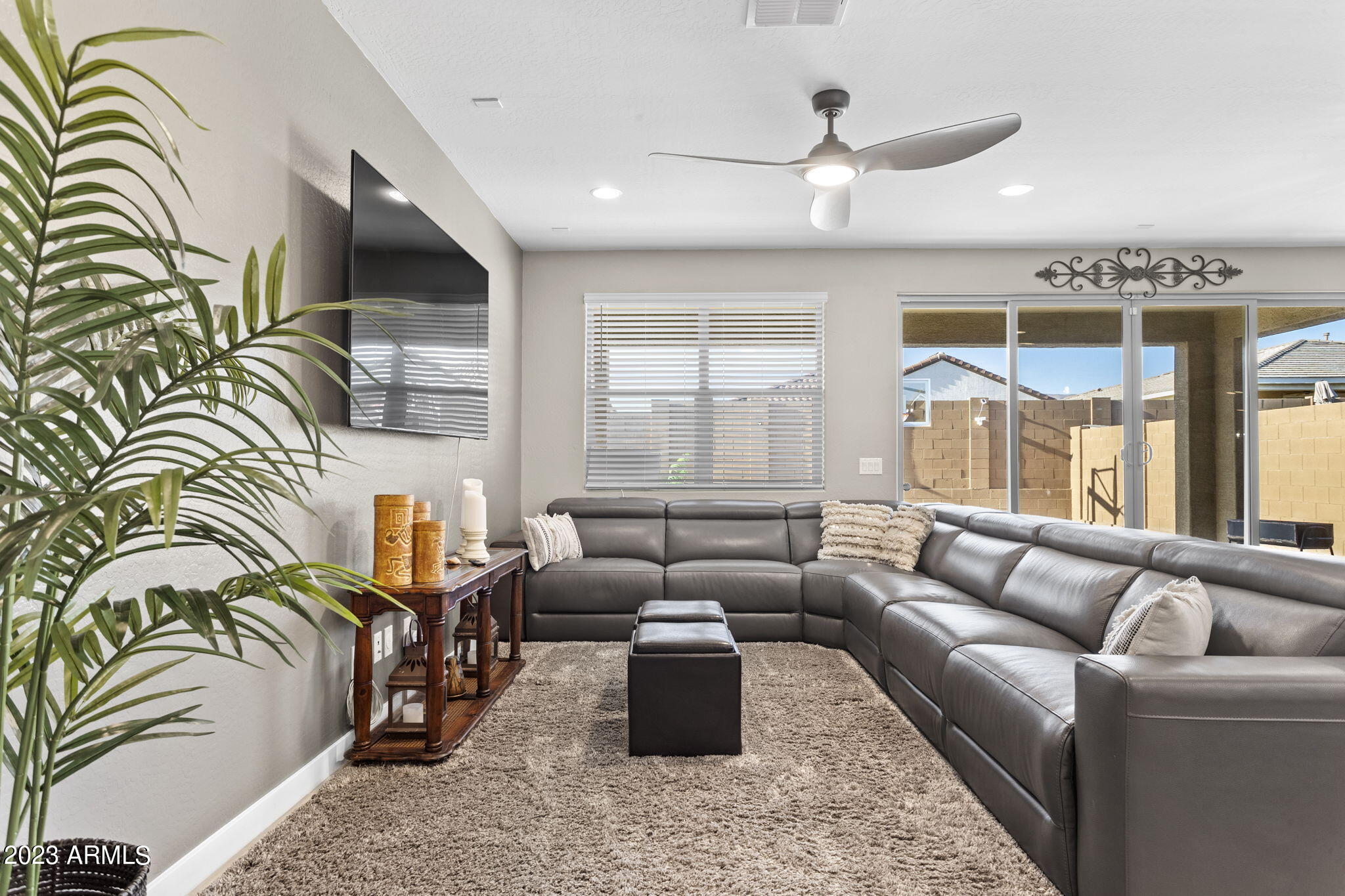 12356 East Soloman Road Gold Canyon, AZ 85118 - Photo 16 of 53 a living room with furniture ceiling fan and a rug