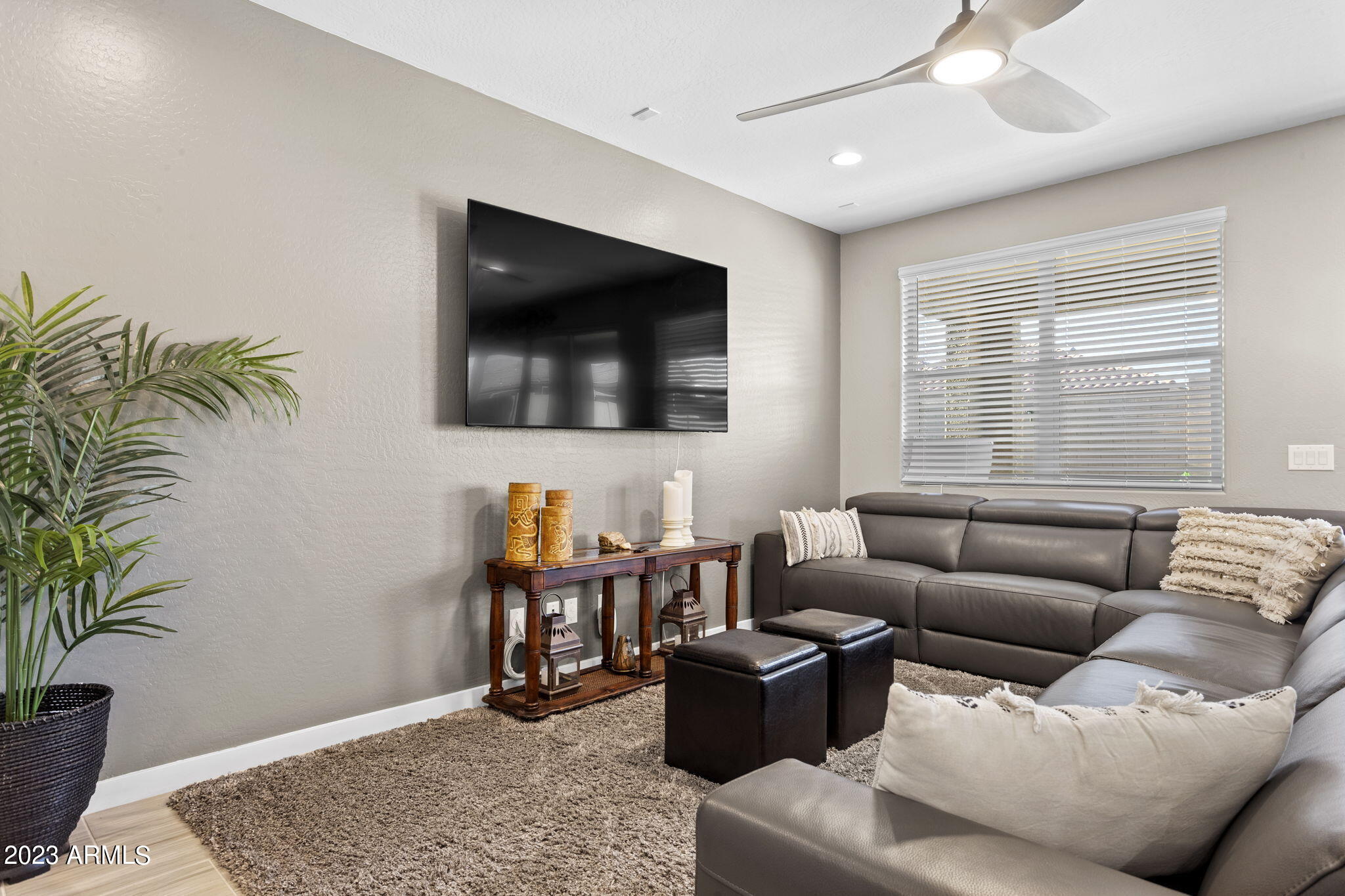 12356 East Soloman Road Gold Canyon, AZ 85118 - Photo 17 of 53 a living room with furniture and a flat screen tv