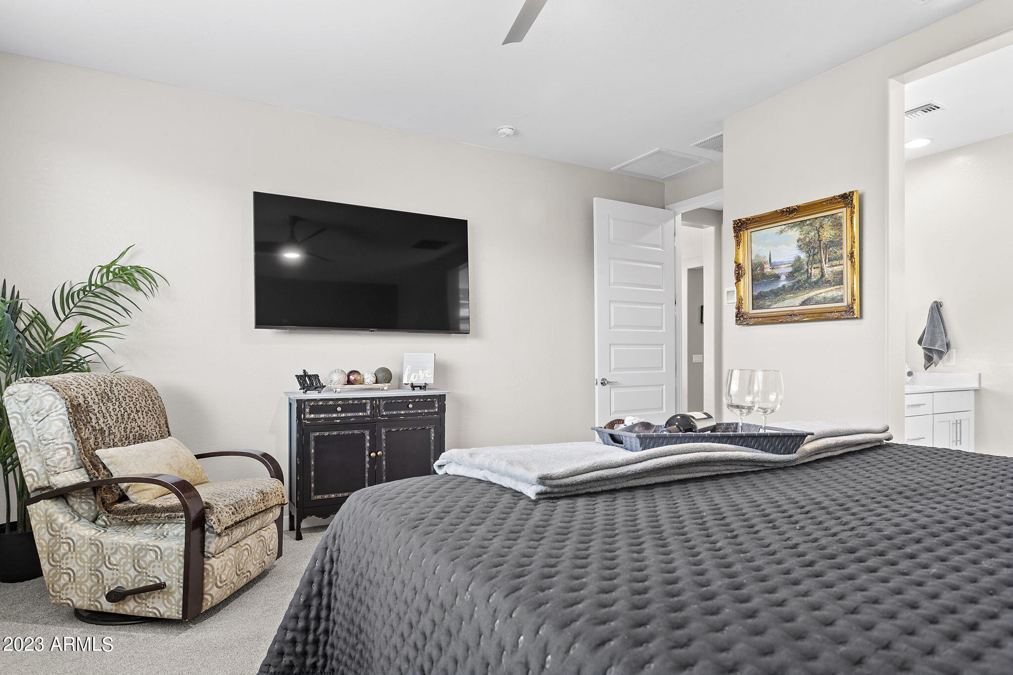12356 East Soloman Road Gold Canyon, AZ 85118 - Photo 20 of 53 a bedroom with a bed and a flat screen tv