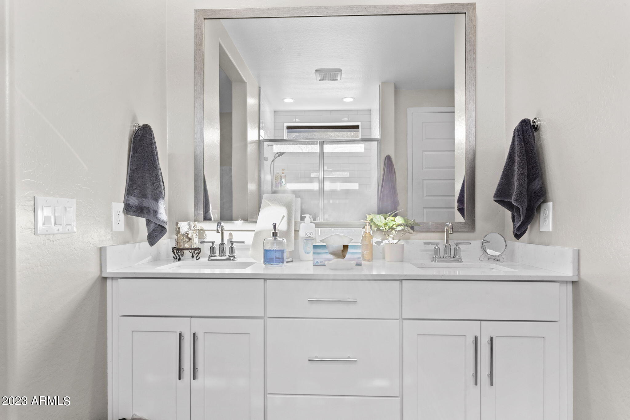 12356 East Soloman Road Gold Canyon, AZ 85118 - Photo 22 of 53 a bathroom with a double vanity sink and a mirror