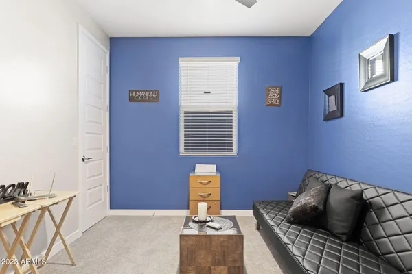 a view of a storage & utility room with a sink