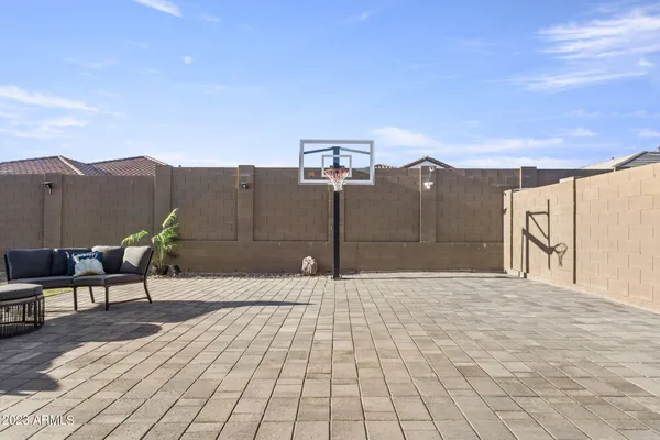 a view of a house with swimming pool and a yard