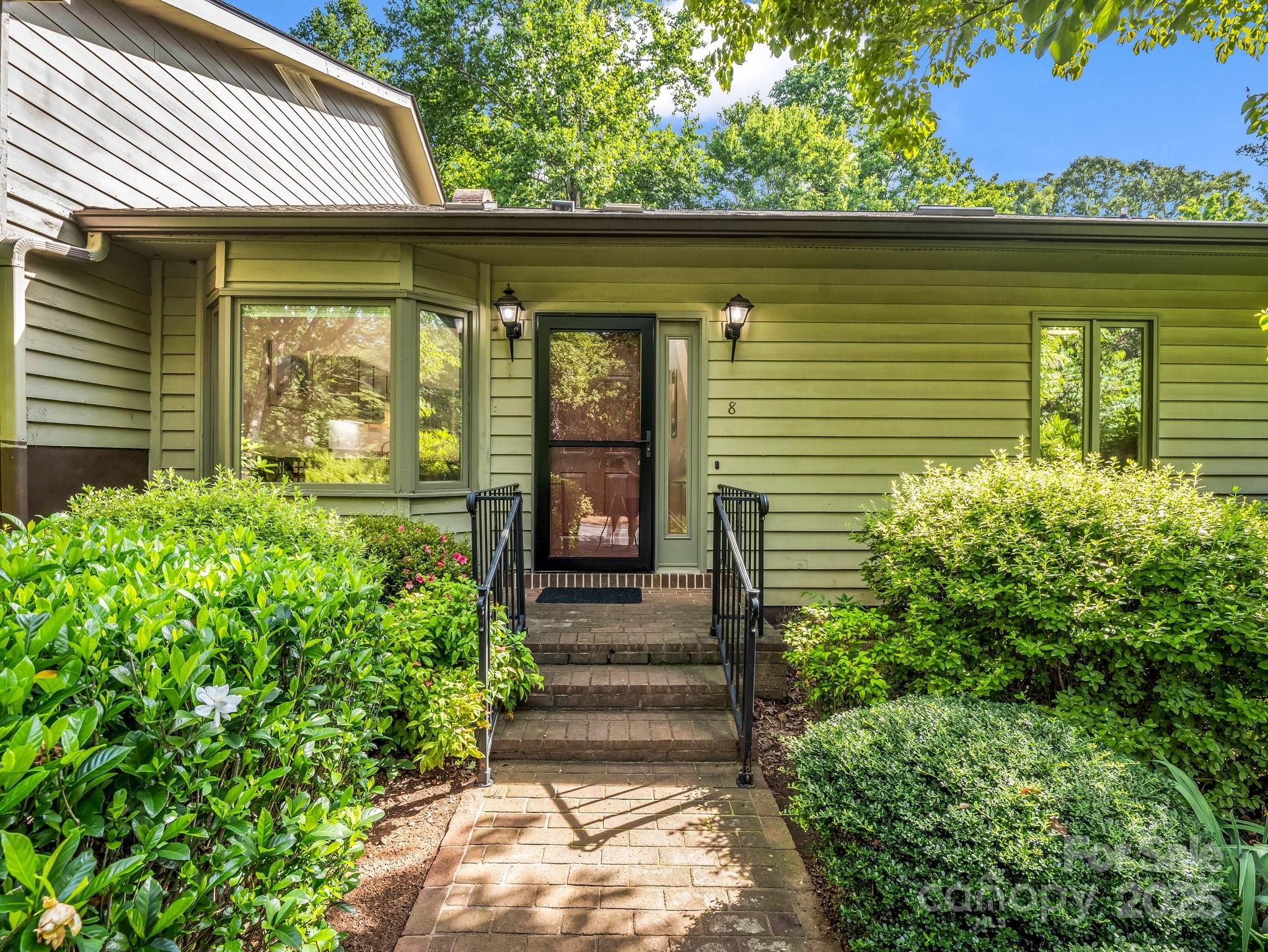 8 Hunting Country Trail Tryon, NC 28782 - Photo 1 of 37 a view of a pathway of the house