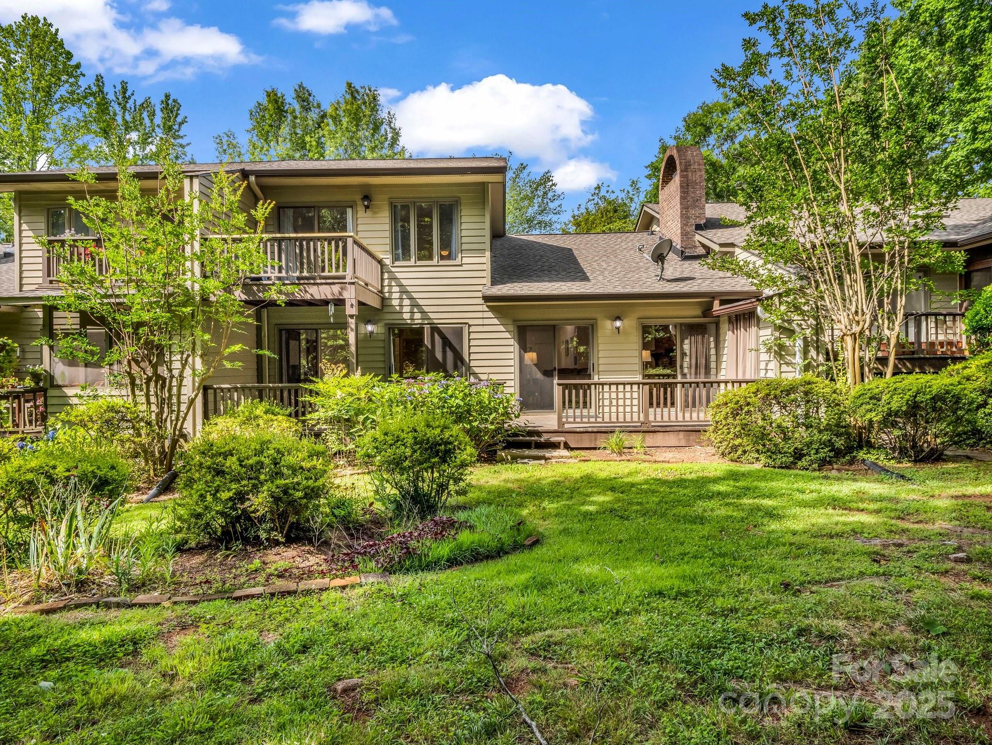 8 Hunting Country Trail Tryon, NC 28782 - Photo 33 of 37 a front view of a house with a yard