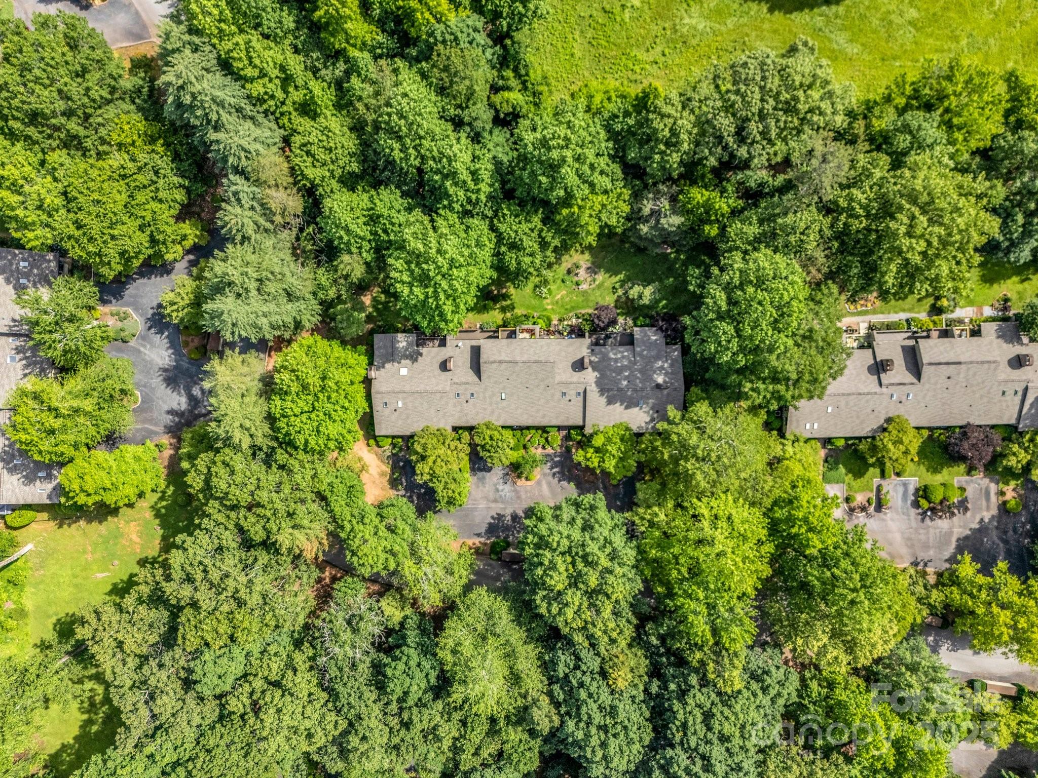 8 Hunting Country Trail Tryon, NC 28782 - Photo 34 of 37 an aerial view of a house with a yard
