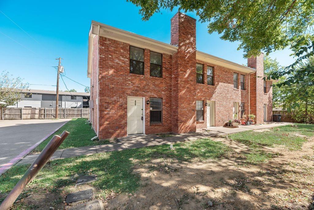 648 South Rogers Road, Unit 648 Irving, TX 75060 - Photo 1 of 20 a view of a house with backyard and garden