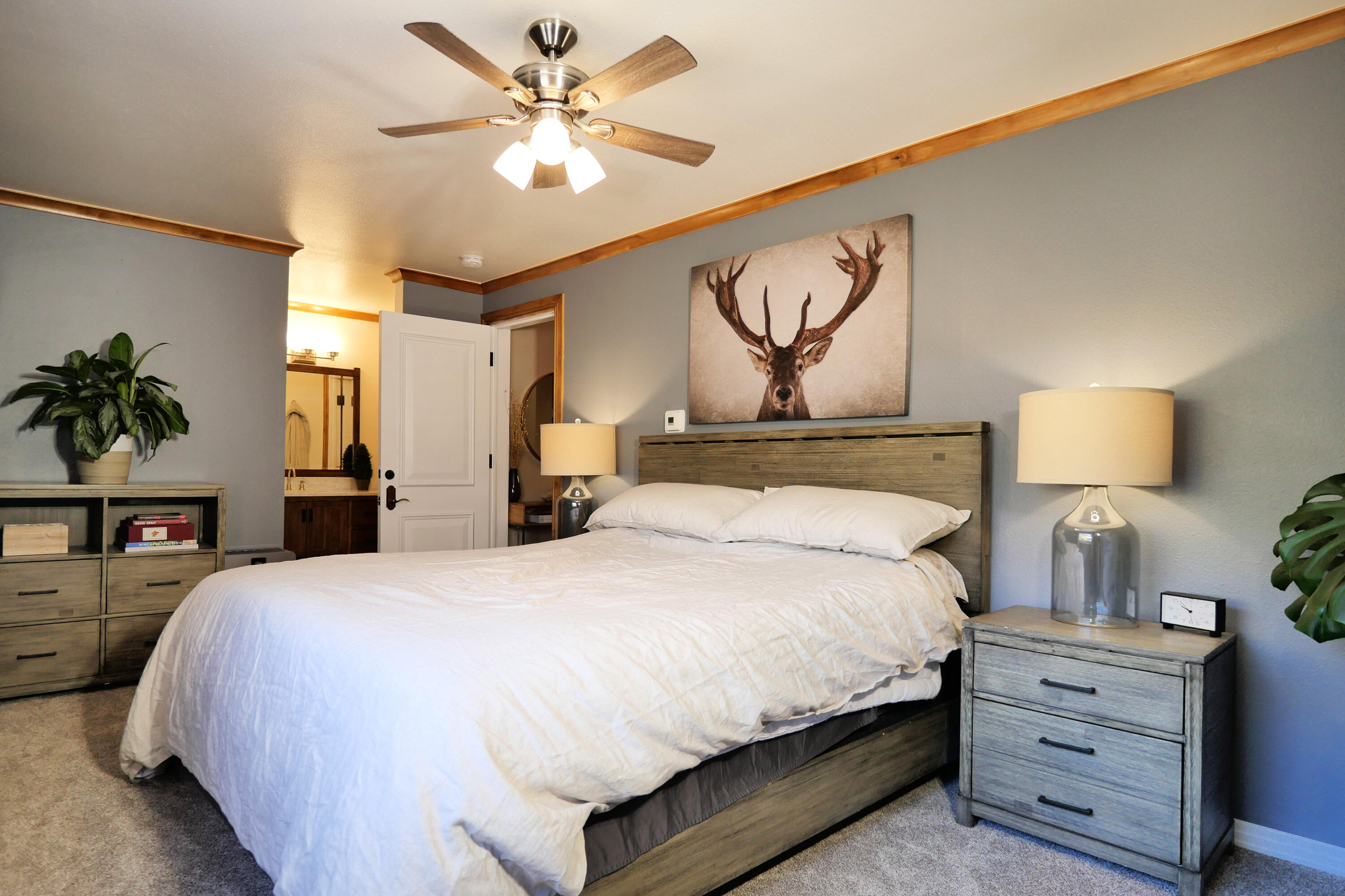 302 Adams Ranch Road, Unit 6 Mountain Village, CO 81435 - Photo 18 of 45 a large bed sitting in a bedroom and a table