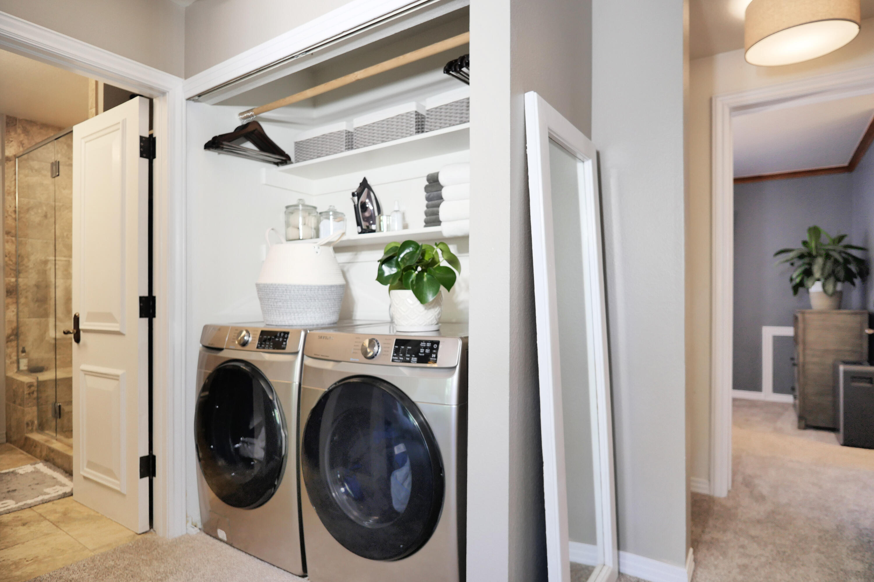 302 Adams Ranch Road, Unit 6 Mountain Village, CO 81435 - Photo 32 of 45 a view of hallway with washer and dryer