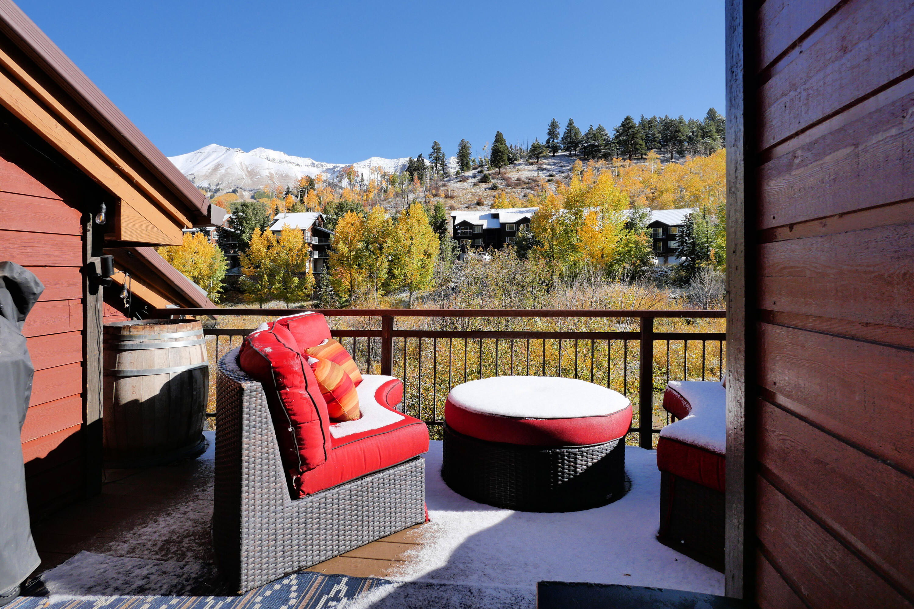 302 Adams Ranch Road, Unit 6 Mountain Village, CO 81435 - Photo 35 of 45 a view of a balcony with furniture