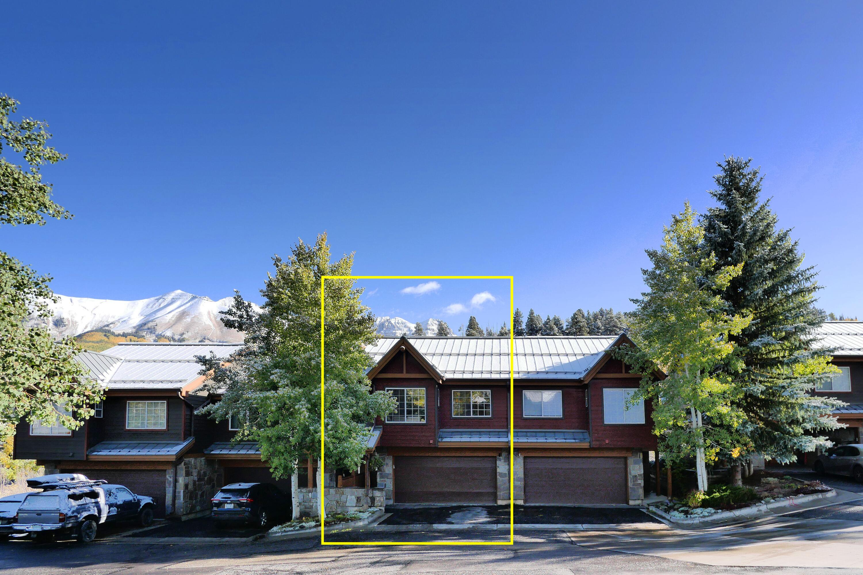 302 Adams Ranch Road, Unit 6 Mountain Village, CO 81435 - Photo 5 of 45 a front view of a building with street view