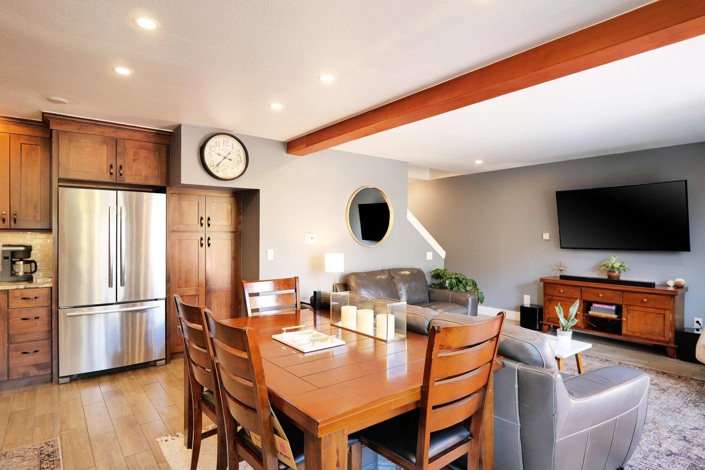 302 Adams Ranch Road, Unit 6 Mountain Village, CO 81435 - Photo 10 of 45 a living room with furniture and a flat screen tv