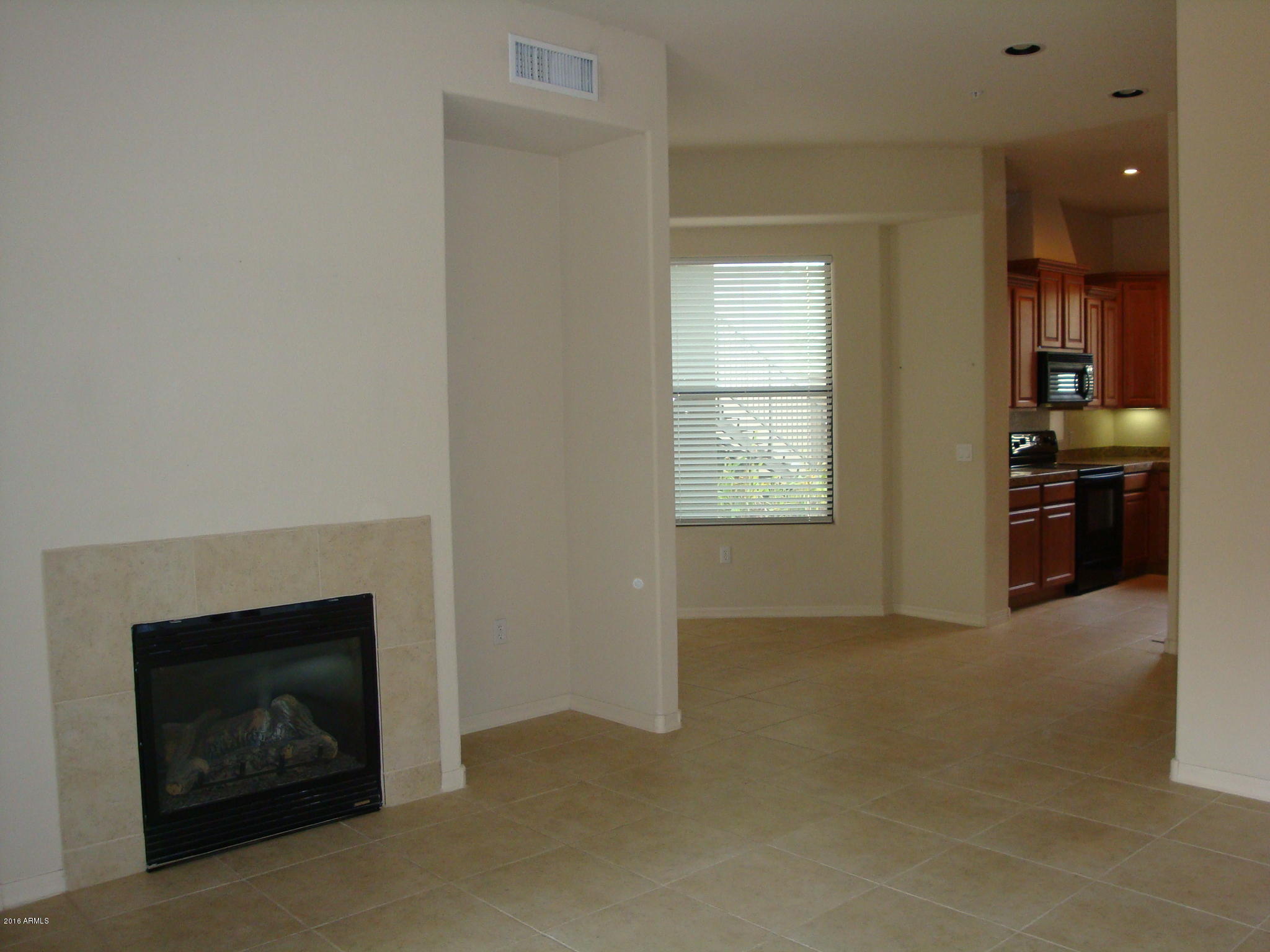 7027 North Scottsdale Road, Unit 131 Paradise Valley, AZ 85253 - Photo 10 of 30 Great Rm wfireplace