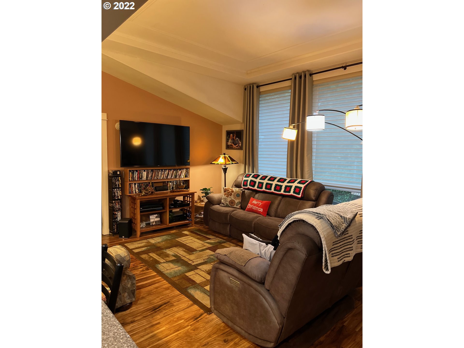 931 30th Way Florence, OR 97439 - Photo 4 of 23 a living room with furniture and a flat screen tv