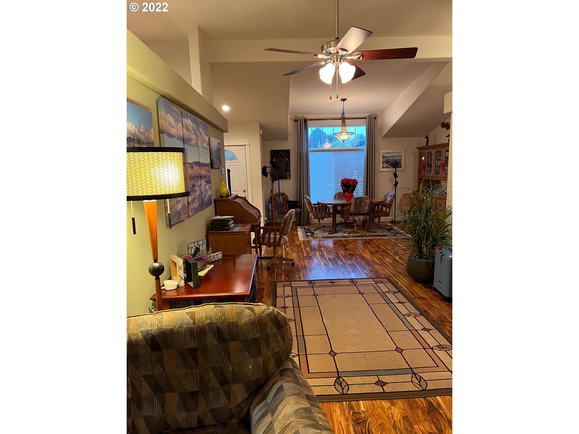 931 30th Way Florence, OR 97439 - Photo 5 of 23 a view of a living room with furniture and a chandelier